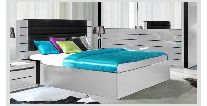 Lit double 180 cm avec option coffre LINA. Coloris blanc et noir brillant avec une finition en simili cuir. Sommier inclus