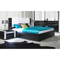 Lit double 160 cm avec option coffre LINA. Coloris noir et blanc brillant avec une finition en simili cuir. Sommier inclus