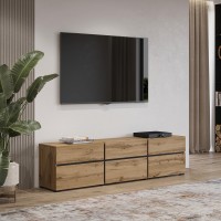 Meuble TV 180cm coloris chêne et noir collection HAVANA. Meuble design avec 3 portes et 3 tiroirs.